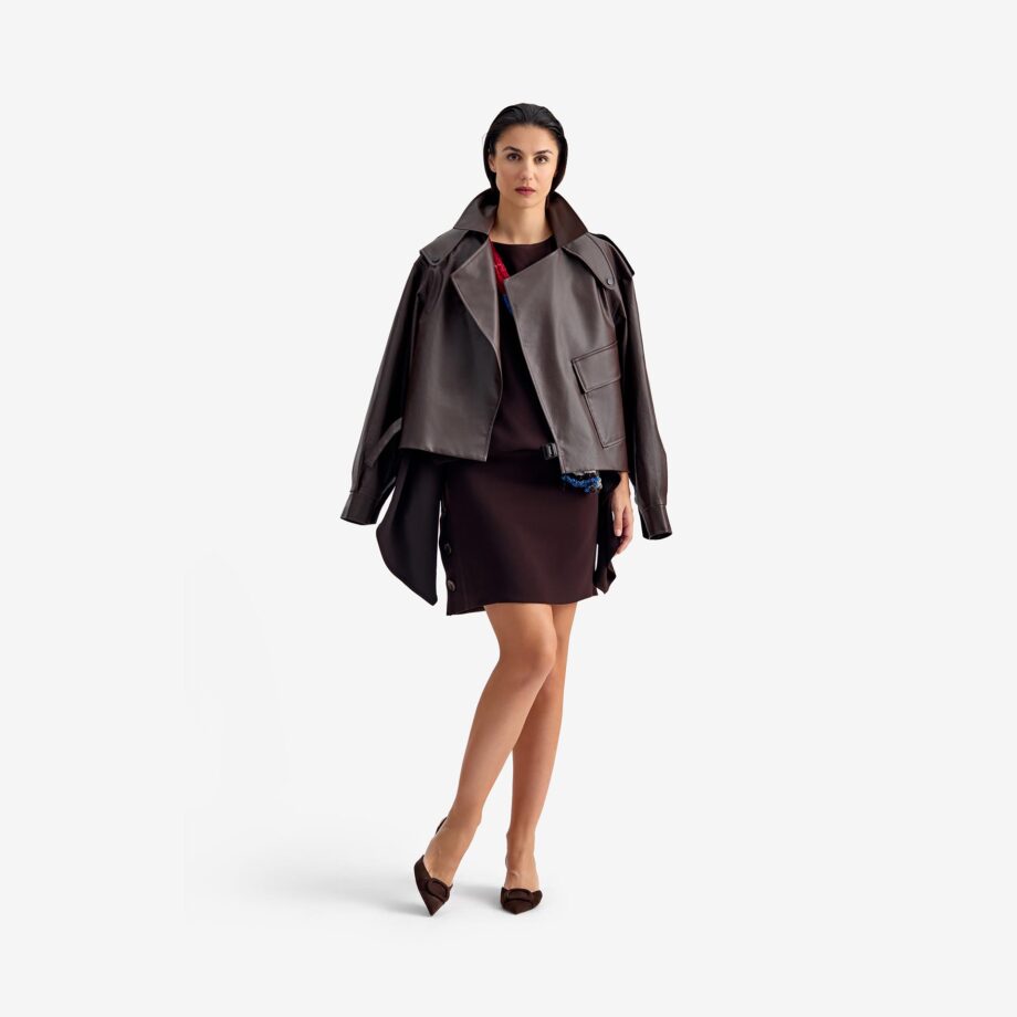 Caterpillar Coat Dark brown - This oversized leather coat draws on military-inspired design, with a large front pocket and structured lines that exude both authority and style.