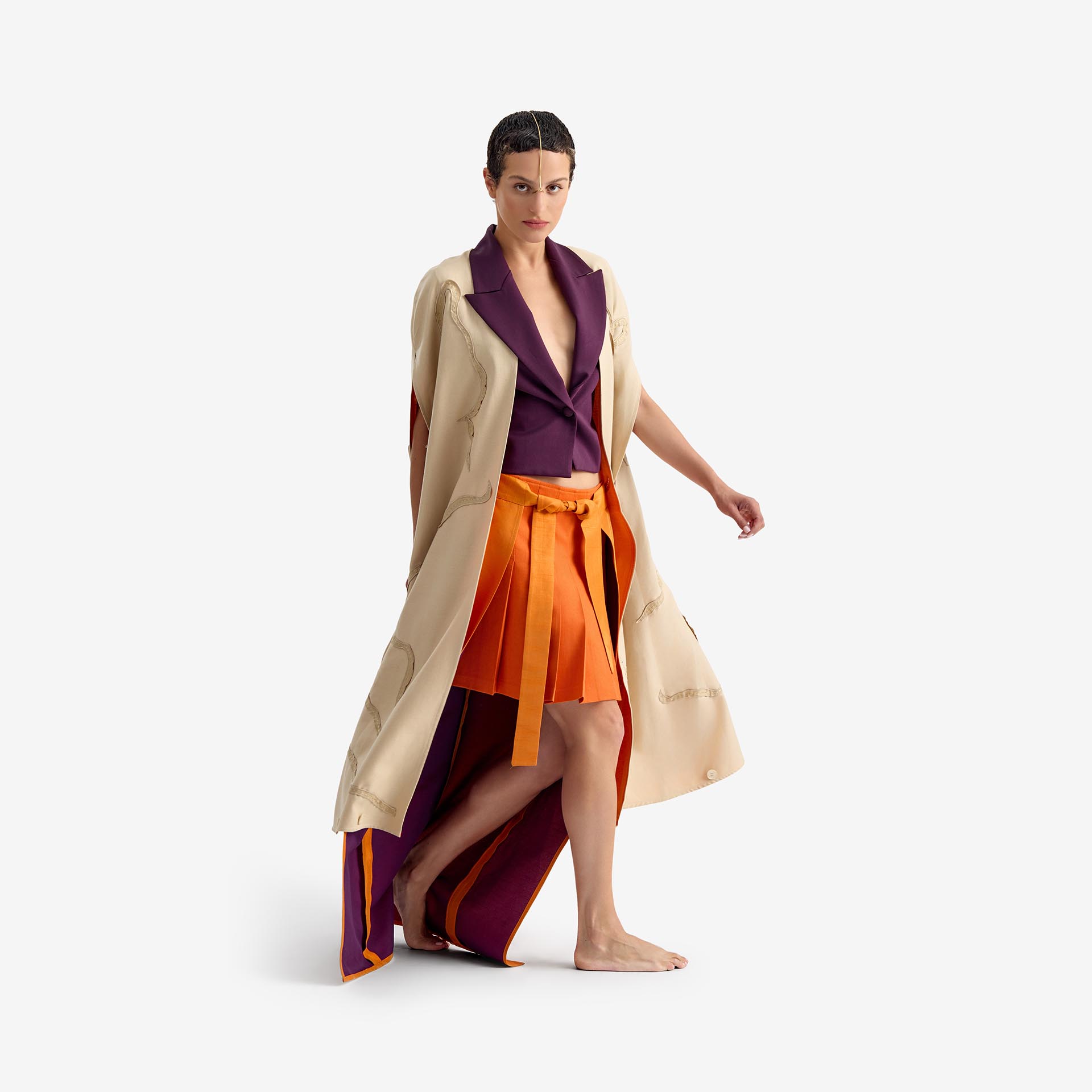 Caterpillar Kimono Jacket - This long orange linen kimono combines tradition and elegance with a lightweight, breathable fabric. Hand-embroidered details add an artisanal touch, making each piece unique.