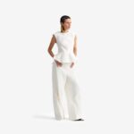 Caterpillar Top Off white - This fitted jacquard top makes a bold, architectural statement with oversized shoulder pads to accentuate the upper silhouette.