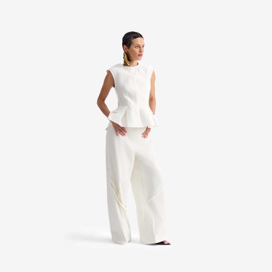 Caterpillar Top Off white - This fitted jacquard top makes a bold, architectural statement with oversized shoulder pads to accentuate the upper silhouette.