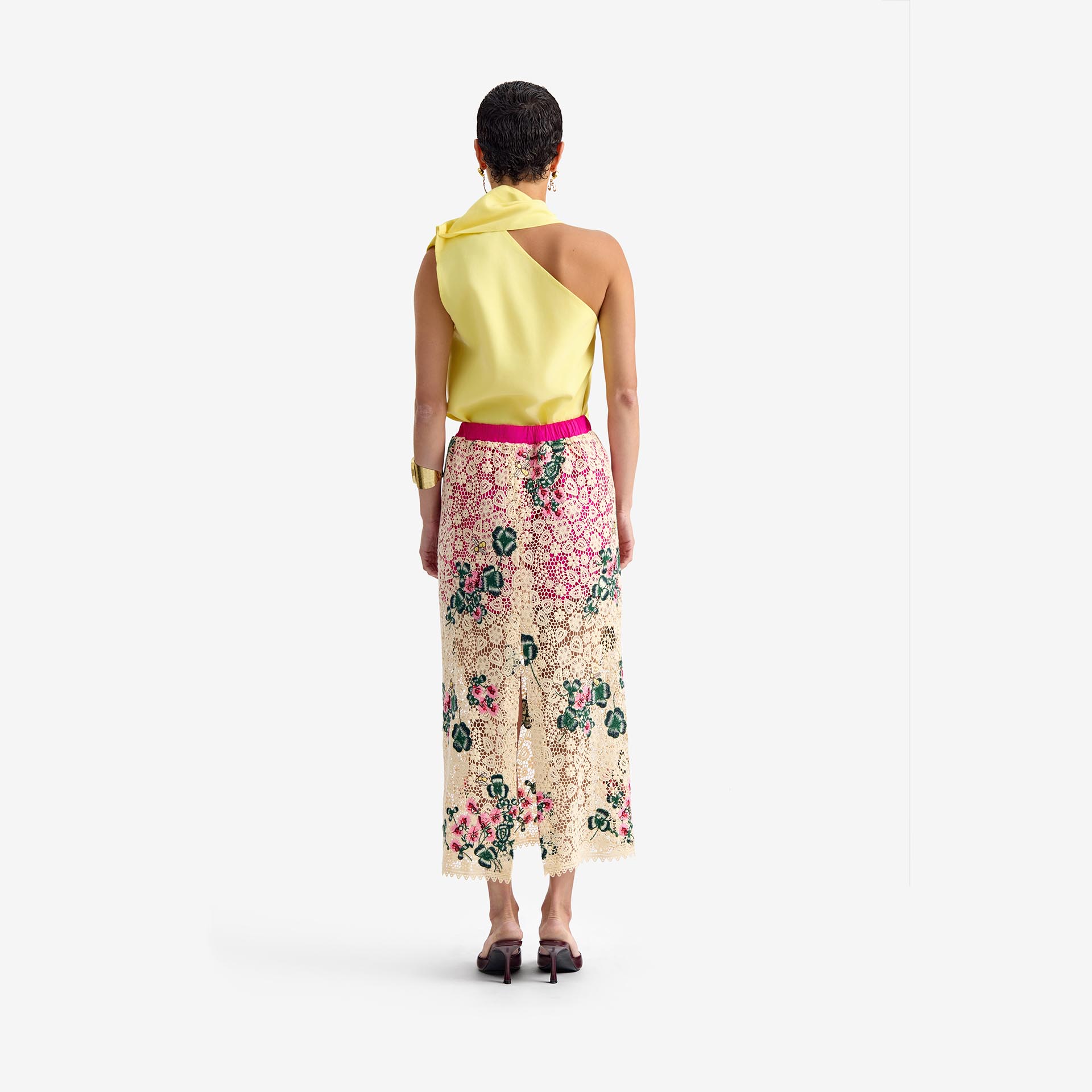 Caterpillar Top Plain yellow - This asymmetric linen top feature a unique neckline and an attached decorative scarf on one shoulder. The scarf can be styled boldly in the front or left to cascade behind for a relaxed, flowing look. A hidden side zipper ensures easy wear while preserving the clean, fitted silhouette. A versatile and stylish piece that offers both flair and elegance.