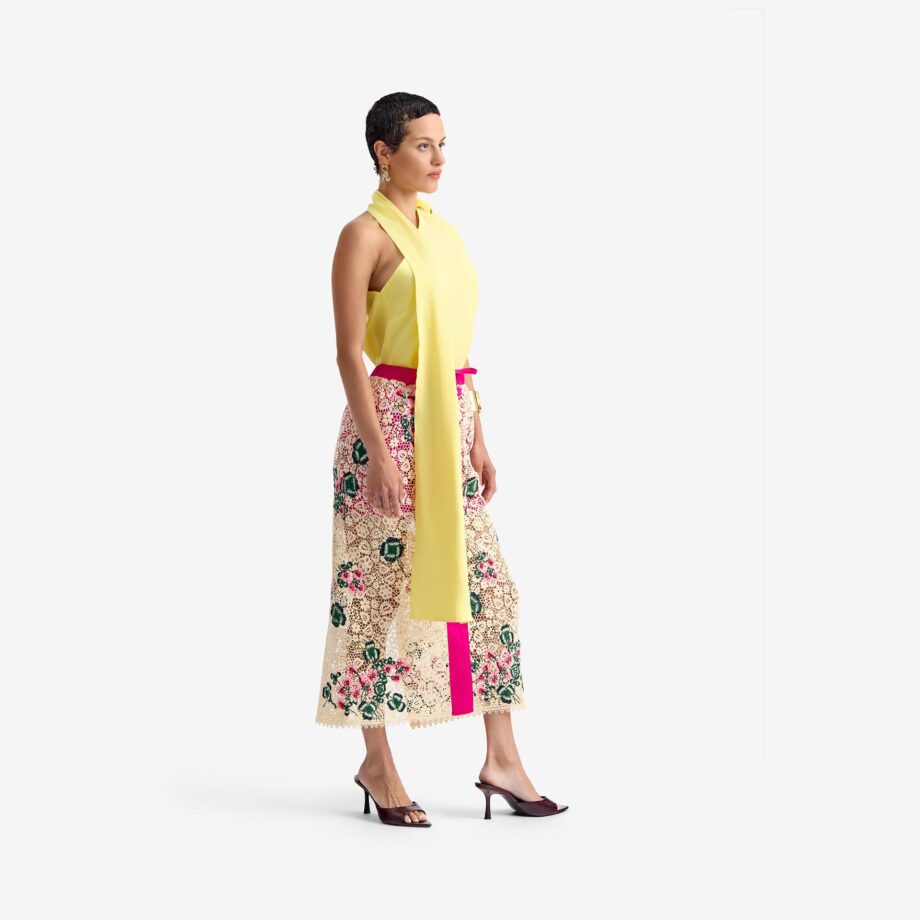 Caterpillar Top Plain yellow - This asymmetric linen top feature a unique neckline and an attached decorative scarf on one shoulder. The scarf can be styled boldly in the front or left to cascade behind for a relaxed, flowing look. A hidden side zipper ensures easy wear while preserving the clean, fitted silhouette. A versatile and stylish piece that offers both flair and elegance.
