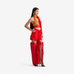 Caterpillar Top Red & Orange - This sheer halter crop top, crafted from ultra-fine chiffon, features a delicate halter neckline, creating a subtle yet striking statement.