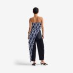 Silk Nest Top Mixed Pattern Denim - This bandeau top showcases a sleek, straight neckline and an asymmetrical silhouette, highlighted by one elongated side with decorative buttons for visual impact.