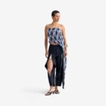 Silk Nest Top Mixed Pattern Denim - This bandeau top showcases a sleek, straight neckline and an asymmetrical silhouette, highlighted by one elongated side with decorative buttons for visual impact.